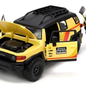 Toyota FJ Cruiser #938 Cream with Matt Black Top with Roof Rack and Stripes "KC Hilites" with Extra Wheels "Just Trucks" Series 1/24 Diecast Model Car by Jada